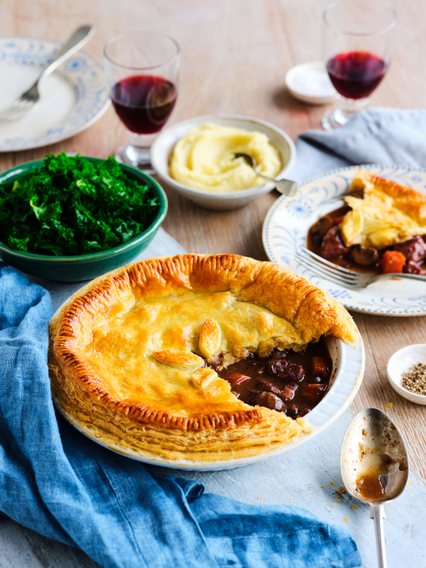 Mixed game pie in red wine